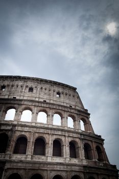 Colosseum against the sky - detailed view of the ancient Roman arena in black and white