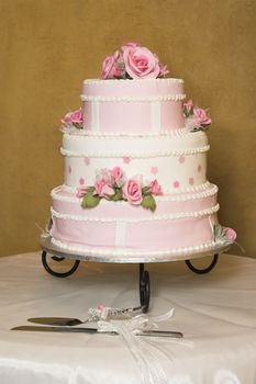 Pink and white floral design wedding cake 