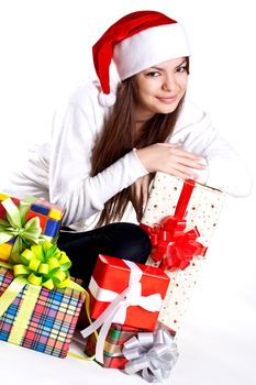 beautiful woman with holiday gift on a white background