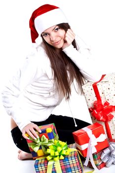 beautiful woman with holiday gift on a white background