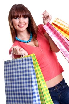 beautiful young woman shopping on a white background