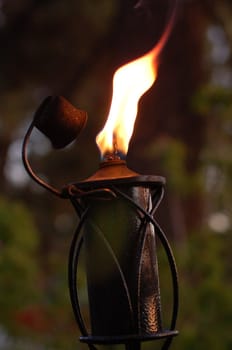 an isolated shot of a Candle Burning at night