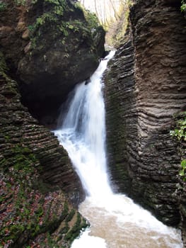 Falls; mountains; caucasus; the river; a stream; splashes; a moisture; a stream; water; rocks; a relief; the nature