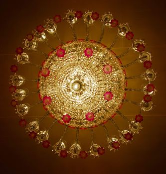 closeup of Home interiors Chandelier on ceiling with lights