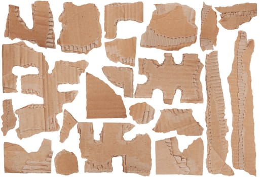 Pieces of torn brown corrugated cardboard, Isolated on White Background