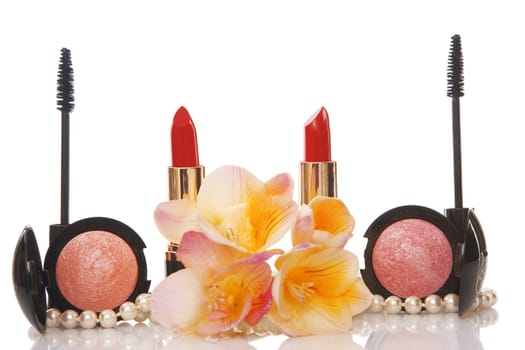 cosmetics and flower on white background, beauty concept
