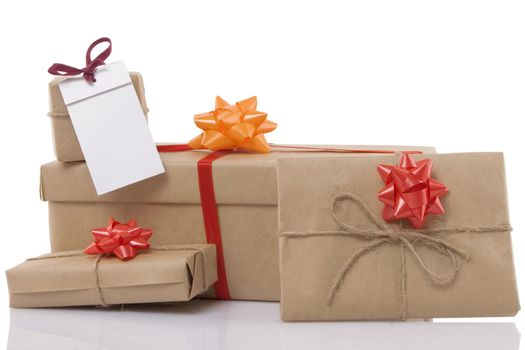 gift boxes with ribbon and blank label on white background