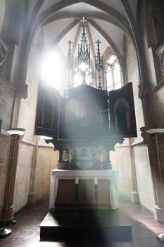 sunlight penetrating the window to the chapel