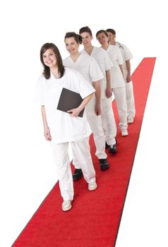 Medical Team on a red Carpet isolated on white background