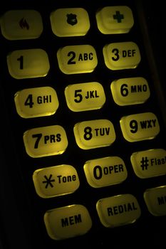 Number telephone key with a yellow backlight