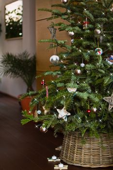 Christmas tree withs lights and decoration - vertical and shallow dept of field