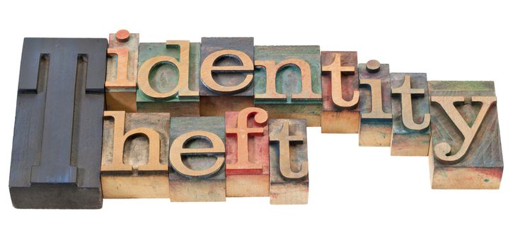 identity theft - isolated phrase in vintage wood letterpress printing blocks