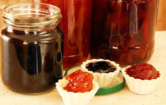 preserves,  jam in small edible treats and glass jars