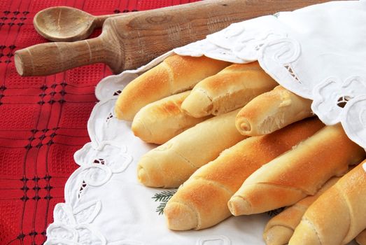 appetizing homemade bread rolled loafs in kitchen
