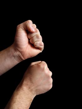 Men's hands. Photographed in a combat stance.