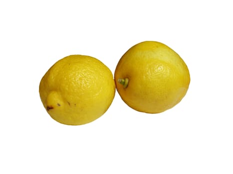 Two yellow lemons photographed up close on white background.