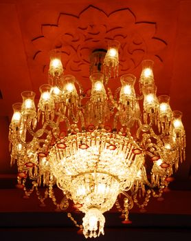 closeup of Home interiors Chandelier on ceiling with lights