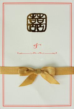 Wedding card with gold bow