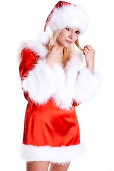 beautiful woman wearing santa claus clothes on a white background