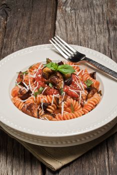 Italian Pasta Norma with tomato,ricotta cheese and eggplants