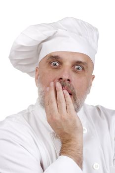 Portrait of a scared chef on white.