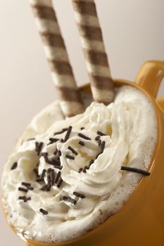 coffee with whipping�cream and chocolate sticks