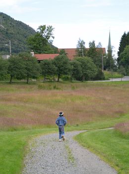 child walking on path