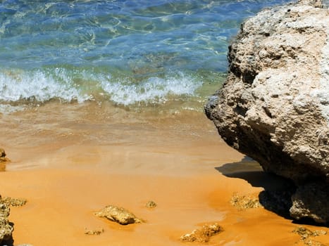 Detail of the waters edge on a tropical beach reef