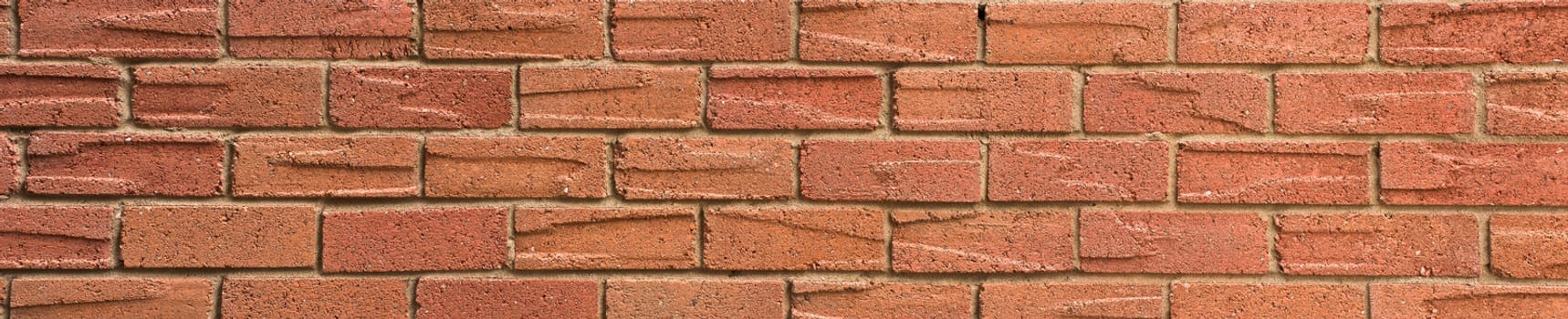 Simple large panoramic red brick wall