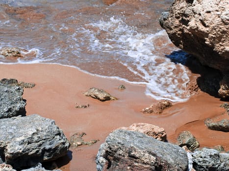 Detail of the waters edge on a tropical beach reef