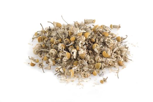 Dried chamomile on a white background.