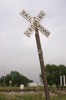 Simple country railway crossing sign