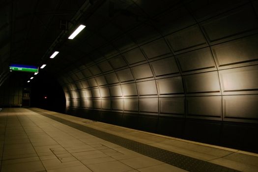 London UK subway station late at night with no other travelers