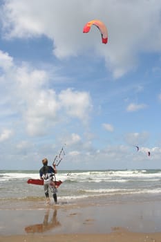Kite surfer about to enter the surf