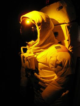 A complete astronaut setup under dramatic lighting.  