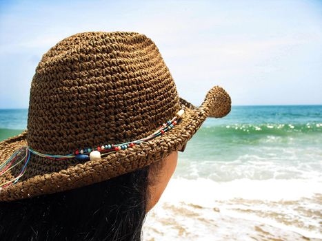 Staring out into the horizon on a bright day at the beach - Assateague Island, located near Ocean City, Maryland.  This is the island where wild horses are native and roam free.