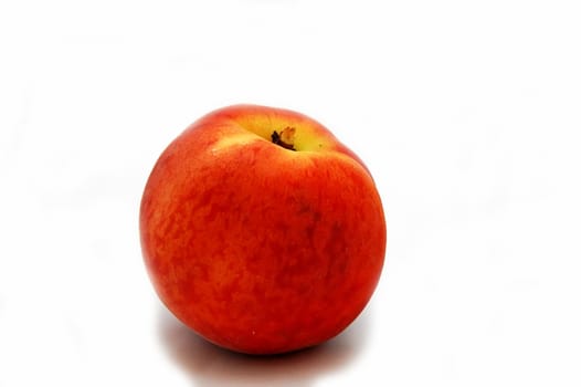 one peach isolated on the white background