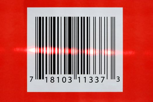A red Laser reading a barcode