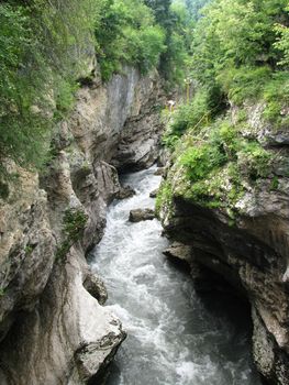 Greens; the Caucasian ridge; rocks; a relief; a landscape; a hill; a panorama; mountains; Caucasus; mountain