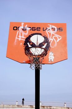 Street basketball board with a bow. Orange virus tournament.