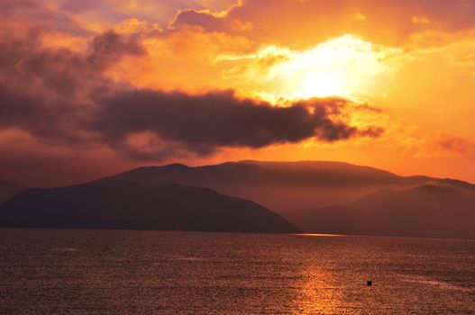 Landscape of golden sunrise at a seashore