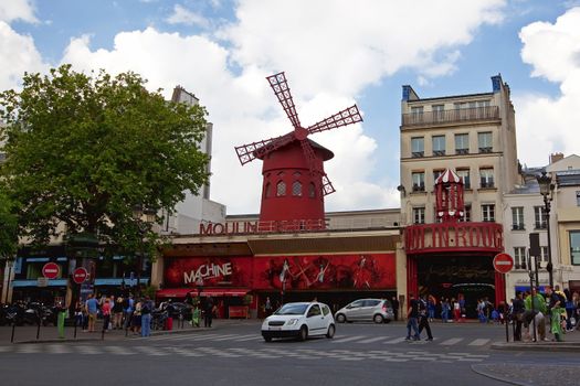 Moulin Rouge, a famous cabaret built in 1889, locating in the Paris red-light district of Pigalle.