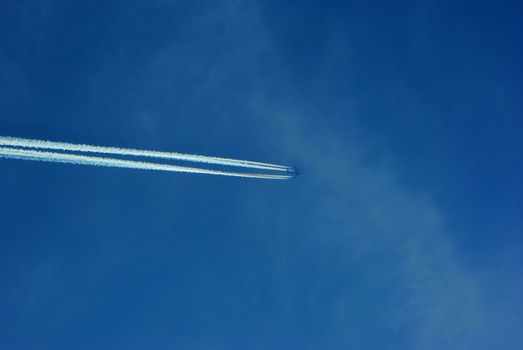 Jet plane with trace in the sky