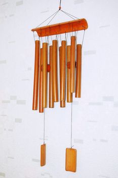 bamboo wind chimes hanging on the wall