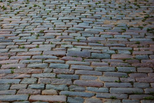 Old stone pavement background in Riga, Latvia