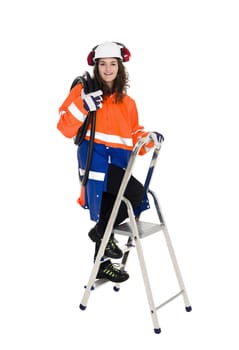 Female Construction Worker climbing a step ladder isolated on white background