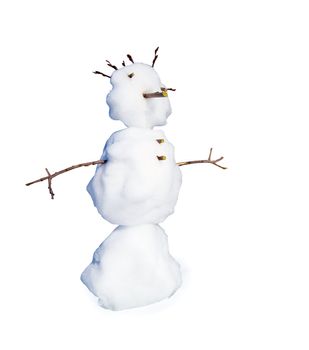 A real snowman is isolated on a white background