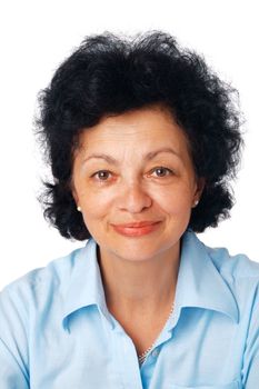 Closeup portrait of a pretty senior female smiling on white background. 
