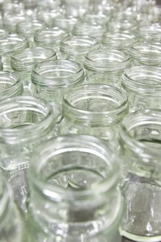 group of empty glass jar in factory