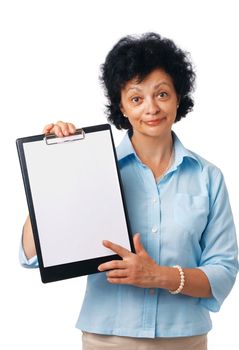 Elder woman holding a clipboard and showing something over white.